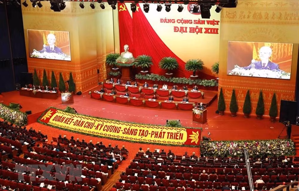 境外新闻媒体纷纷聚集越共十三大开幕式 ảnh 1