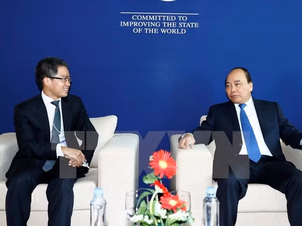 阮春福总理会见世界经济论坛各大集团公司领导人 ảnh 1
