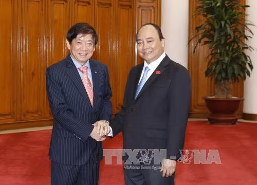 阮富仲与阮春福分别会见新加坡人民行动党主席许文远 ảnh 2 阮富仲与阮春福分别会见新加坡人民行动党主席许文远 ảnh 2