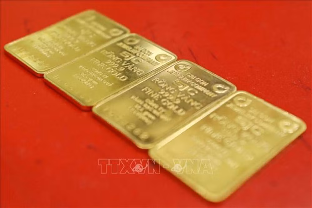 越南国家银行副行长陶明秀：国家不鼓励金条交易，也不保护金价 ảnh 2