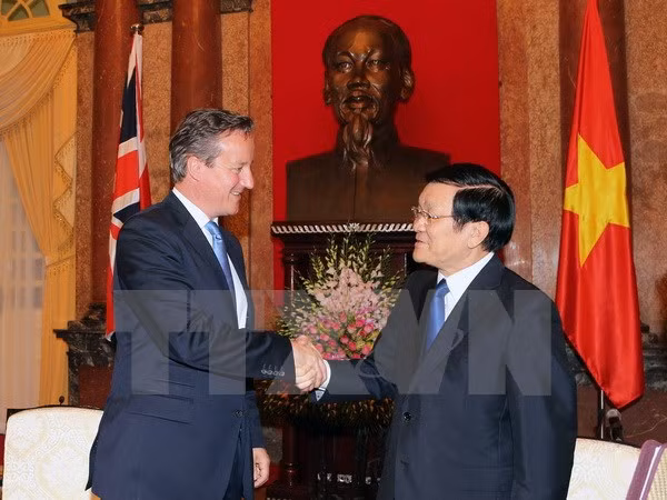 越南国家主席张晋创会见英国首相卡梅伦 ảnh 1