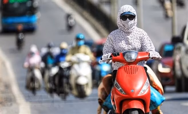 全国多地出现高温炎热天气 ảnh 1