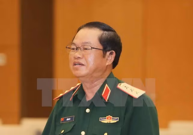 越南人民军高级军事代表团对老挝进行正式访问 ảnh 1
