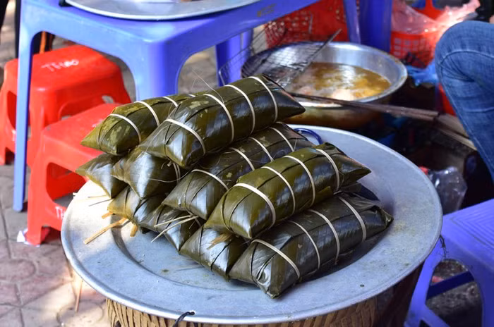 黑色粽子——越南老街省岱族同胞春节饮食文化特色 ảnh 1 黑色粽子——越南老街省岱族同胞春节饮食文化特色 ảnh 1