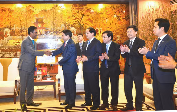 河内市向可口可乐越南公司颁发调整注册资金许可证 ảnh 1
