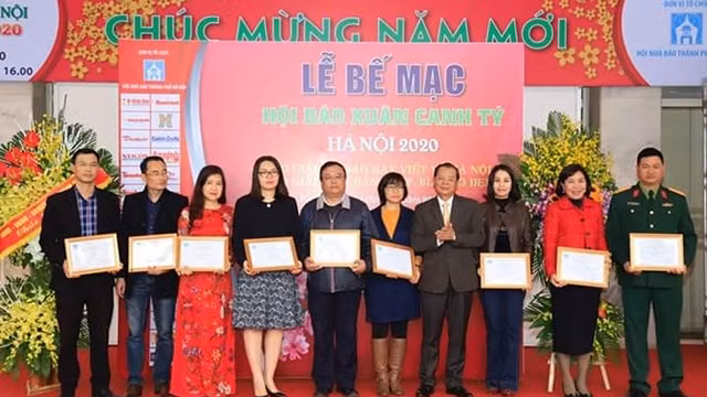 2020庚子年春节特刊展在越南全国各地举行 ảnh 1