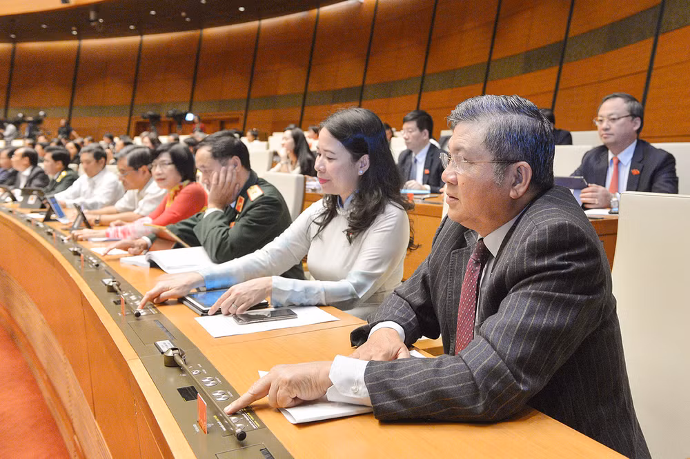 越南第十四届国会第十次会议公报(第十八号) ảnh 2 越南第十四届国会第十次会议公报(第十八号) ảnh 2