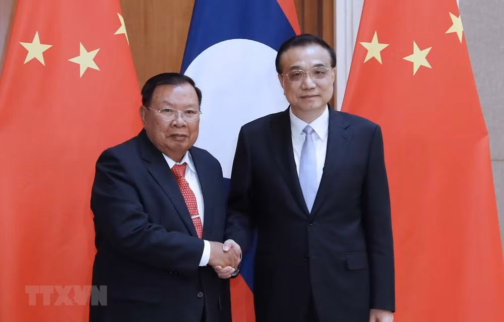 中国总理李克强会见老挝人民革命党总书记、国家主席本扬 ảnh 1