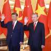 越共中央总书记苏林与中共中央总书记、国家主席习近平举行小范围会晤。图自 越通社