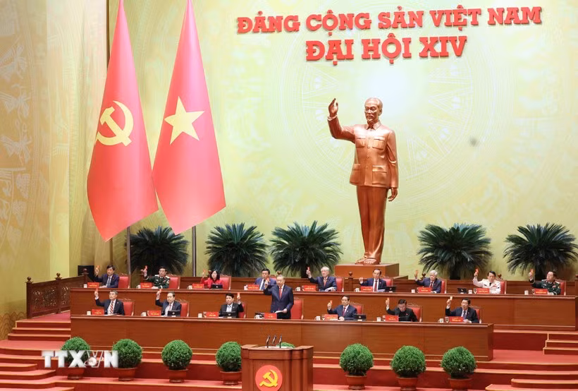 各位代表表决通过了越共第十四届中央委员会委员人数。图自越通社