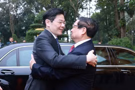 越南政府总理范明政举行隆重仪式欢迎新加坡总理黄循财访越