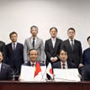 合作谅解备忘录签署仪式现场。图自越通社