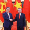 越共中央总书记苏林与中共中央总书记、国家主席习近平。图自越通社