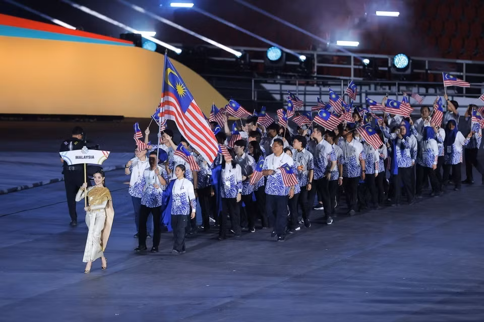 马来西亚体育代表团参加在泰国举行的第33届东南亚运动会。图自越通社