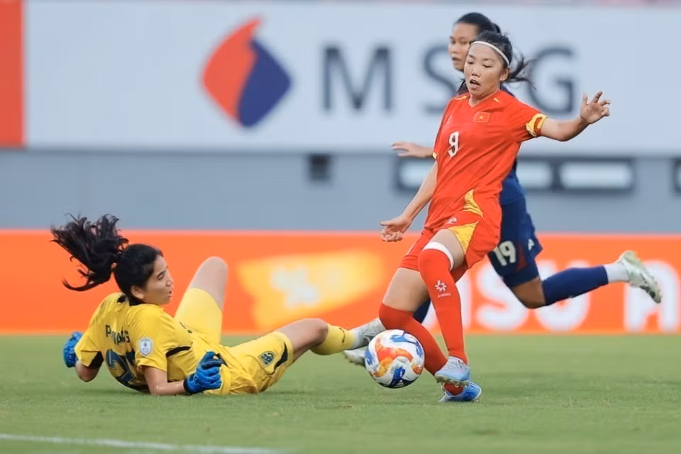 越南女足队长黄如（9号）攻入一球，将比分扩大为2比0。图自越通社