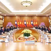 越共中央书记处常务书记陈锦秀与老挝人民革命党中央书记处常务书记维莱·拉坎丰举行会谈。图自越通社