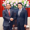 越南公安部部长梁三光会见柬埔寨内政部国务秘书Santibindit Chan Ean。图自越通社