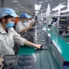 越南跻身中等偏上收入国家行列。图自越通社