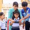 家庭、学校和社会携手构建“数字盾牌”，保护儿童在网络环境中的安全。图自越通社